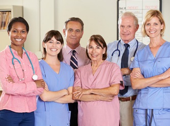 group of female and male nurses and doctors